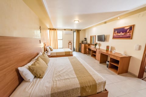 Family Room, 2 Double Beds | In-room safe, blackout drapes, free WiFi, bed sheets