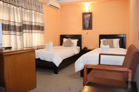 Standard Double or Twin Room, 1 Bedroom | 1 bedroom, pillowtop beds, in-room safe, desk