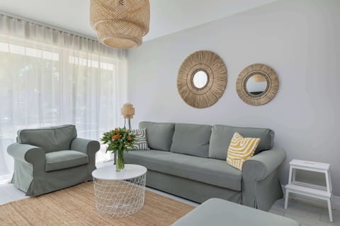 Living room with a comfortable sofa and TV.