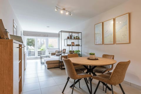 Spacious Living and Dining Area with Garden View