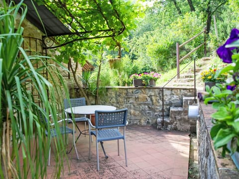 Furniture, Outdoor Furniture, Outdoor Table, Garden, Flowerpot, Chair, Backyard, Shade, Houseplant, Yard