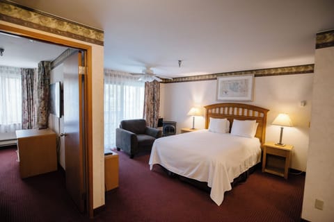Suite, 2 Queen Beds | Laptop workspace, iron/ironing board, free WiFi, bed sheets