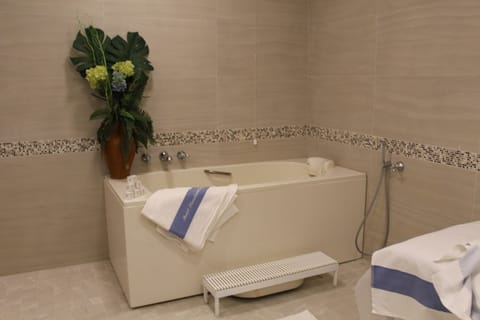 Spa tub, body treatments, mud baths, aromatherapy, hot stone massages