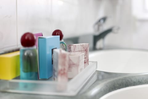 Triple Room, Pool View | Bathroom | Shower, free toiletries, bidet, towels