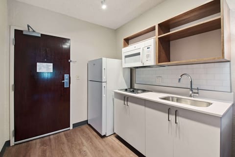 Studio, 1 Queen Bed, Non Smoking | Private kitchen | Fridge, microwave, stovetop, coffee/tea maker