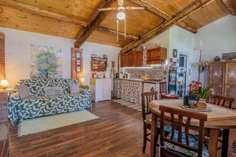 Loft, Garden View | Living area | 32-inch TV with digital channels, fireplace