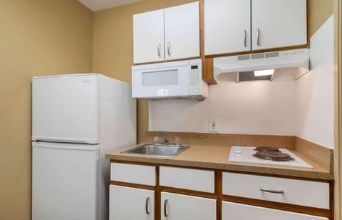 Studio, 1 Queen Bed, Non Smoking | Private kitchen | Full-size fridge, microwave, stovetop, coffee/tea maker