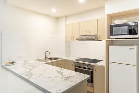 One Bedroom Lakeview Apartment | Private kitchen | Fridge, coffee/tea maker