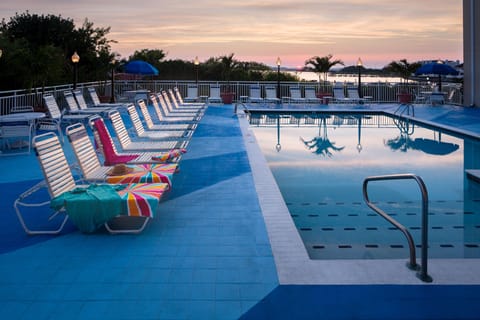 Seasonal outdoor pool, pool umbrellas