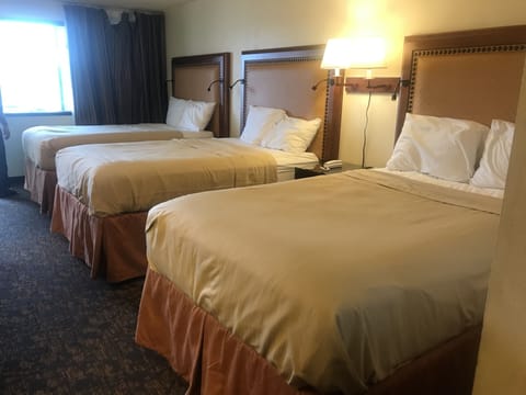 Room, Multiple Beds | Premium bedding, desk, iron/ironing board, free WiFi
