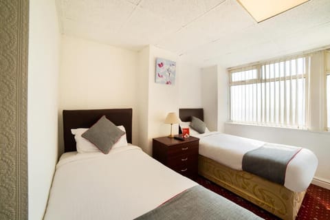 Desk, laptop workspace, free WiFi, bed sheets