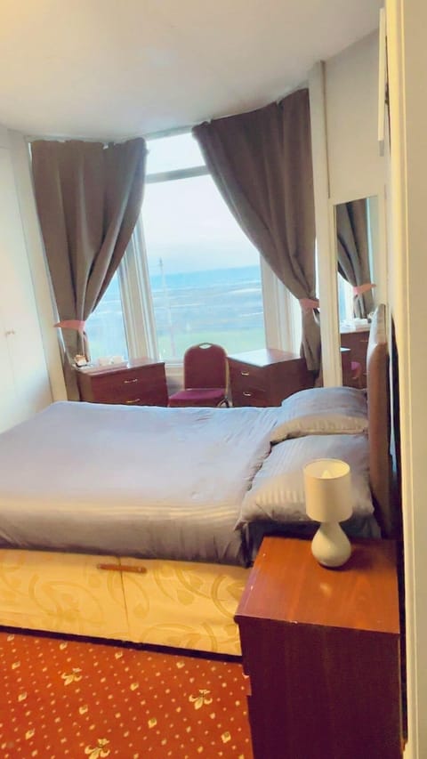 Desk, laptop workspace, free WiFi, bed sheets