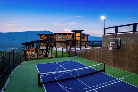 Sports Court – Regulation pickleball & basketball court (lit for night play)
