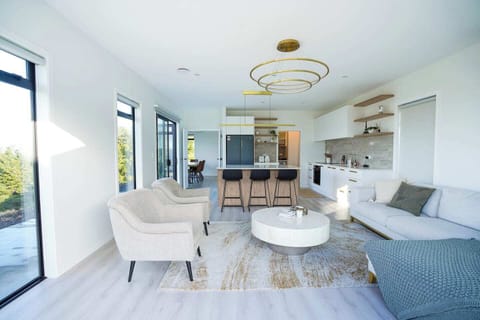 relax in 1 of 2 living rooms while a nice home meal is being prepared 