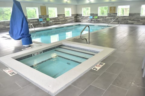 Indoor pool, open 7 AM to 11 PM, sun loungers