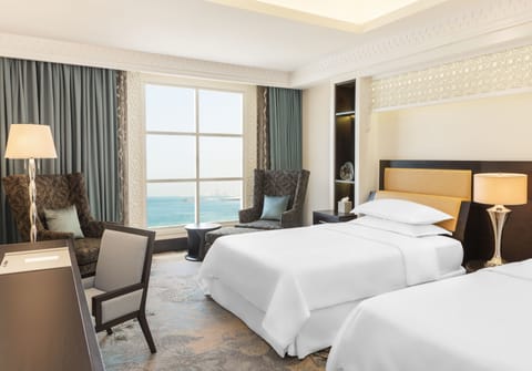 Superior Room, 2 Double Beds, Sea View | Minibar, in-room safe, desk, laptop workspace