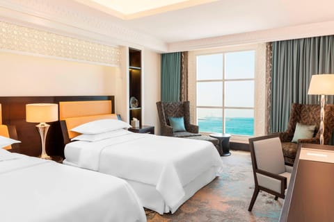 Superior Room, 2 Double Beds, Sea View | Minibar, in-room safe, desk, laptop workspace