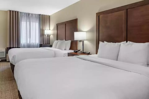 Standard Room, 2 Queen Beds, Non Smoking | Pillowtop beds, in-room safe, desk, laptop workspace