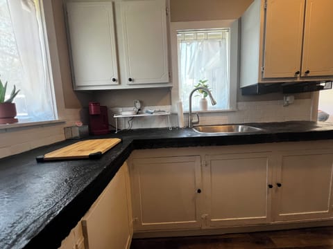 lots of light through the windows in this cozy kitchen
