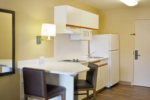 Studio, 1 King Bed, Non Smoking | Private kitchen | Full-size fridge, microwave, stovetop, coffee/tea maker