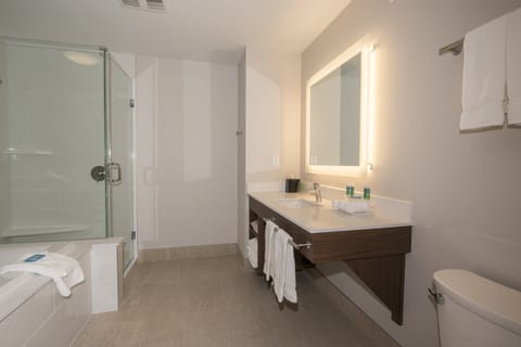 Suite, 1 King Bed with Sofa bed, Jetted Tub | In-room safe, desk, laptop workspace, blackout drapes