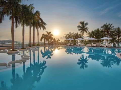 Outdoor pool, pool umbrellas, sun loungers