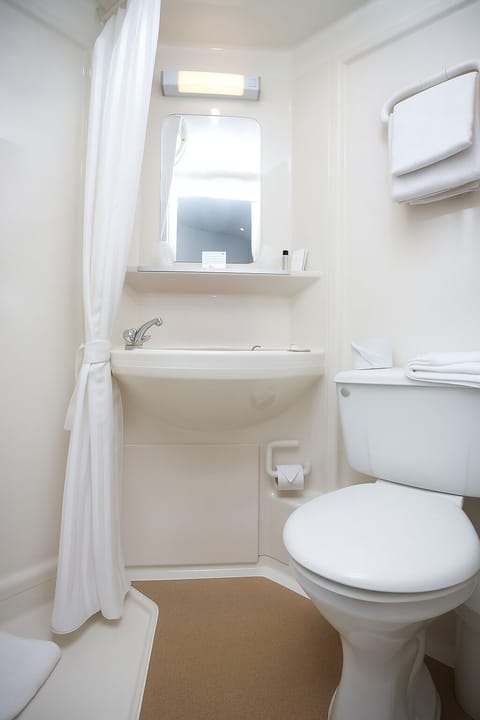 Shower, eco-friendly toiletries, hair dryer, towels