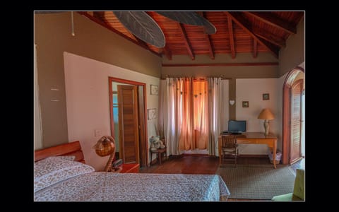 Honeymoon Suite, 1 King Bed, Balcony, Pool View | Minibar, individually decorated, individually furnished