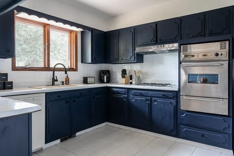 Fully equipped kitchen stocked with cookware and essentials. Ready for everything from quick bites to full meals.