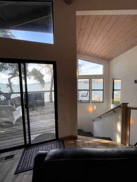 Upstairs sliding door out to upper deck.  Stairs leading to 2nd level rooms.