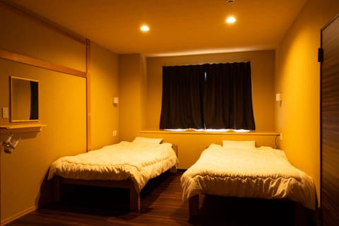 Japanese-Style Family Room with Bed with Shared Bathroom | In-room safe, free WiFi, bed sheets
