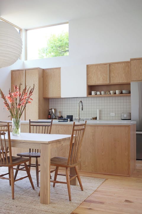 Sunny eat-in kitchen and dining room with brand new cook's kitchen.
