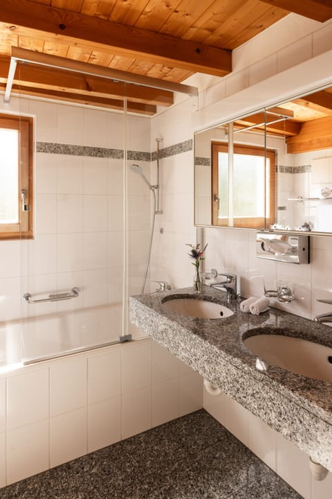 Deluxe Double Room | Bathroom | Combined shower/tub, deep soaking tub, free toiletries, hair dryer