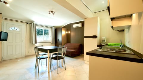 Basic Villa, 1 Bedroom | Living area | Flat-screen TV