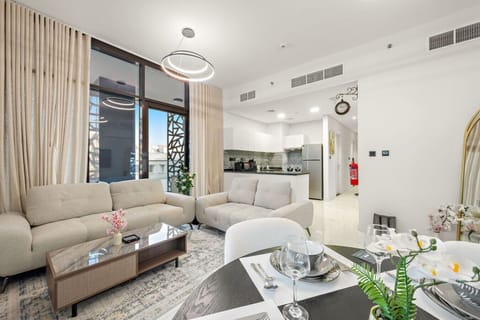 Living Room: Bright space with modern decor, a sleek kitchen, and stunning views awaits you!