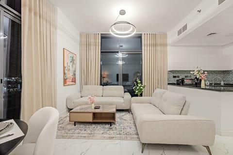 Living Room: Bright space with modern furniture and stunning city views—perfect for relaxation!