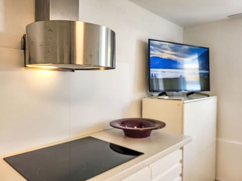 Interior Design, Countertop, Lighting, Kitchen Appliance, Flooring, Ceiling, Furniture, Cabinetry, Room, Home Appliance