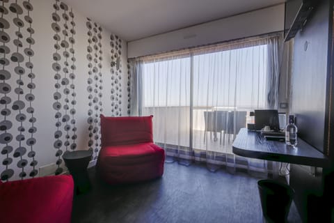 Suite, Terrace, Sea view | Living area | Flat-screen TV