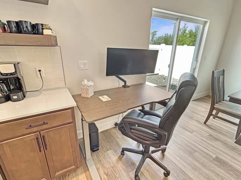 Adjustable office desk and chair