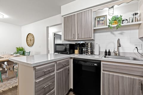 Enjoy a chef-ready kitchen featuring modern finishes, a complete knife set, a spice rack, and all the tools you need to prepare meals.