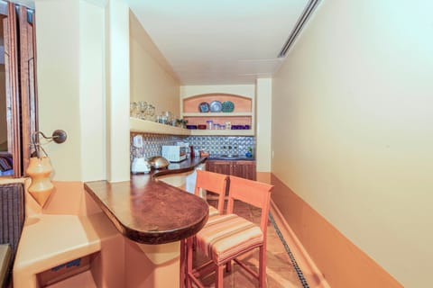 Suite, 1 Bedroom, Balcony | Private kitchen | Mini-fridge, microwave, coffee/tea maker, cookware/dishes/utensils