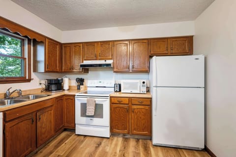 The inviting kitchen offers ample space & all the comforts of home