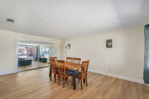 Open concept living and dining area—perfect for relaxing, entertaining, and spending time together.