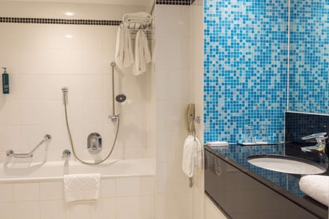 Suite, 1 King Bed, Non Smoking | Bathroom | Combined shower/tub, deep soaking tub, free toiletries, hair dryer