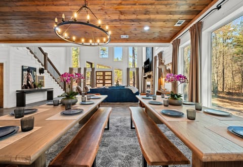 The spacious dining area is set for memorable meals, with a stylish setup that makes every dinner feel special.