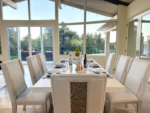 Hilltop Villa: Formal or casual living room dining with a view. (2)