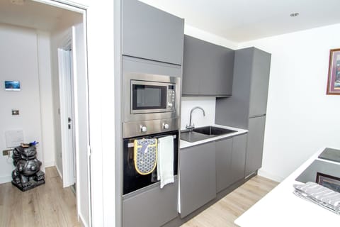 Family Apartment, Balcony, Garden View | Private kitchen | Highchair