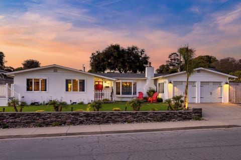 Charming front view of the home at sunset.