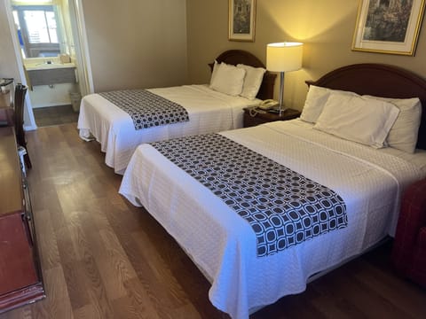 Room, 2 Queen Beds, Smoking | Desk, iron/ironing board, free WiFi, bed sheets