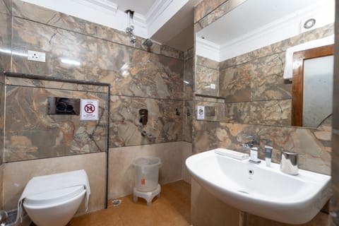 Premium Room | Bathroom | Shower, designer toiletries, hair dryer, slippers